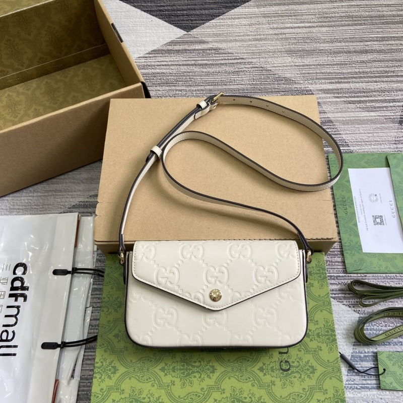 G*u*i satchel bags